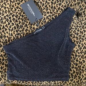 One shoulder black top